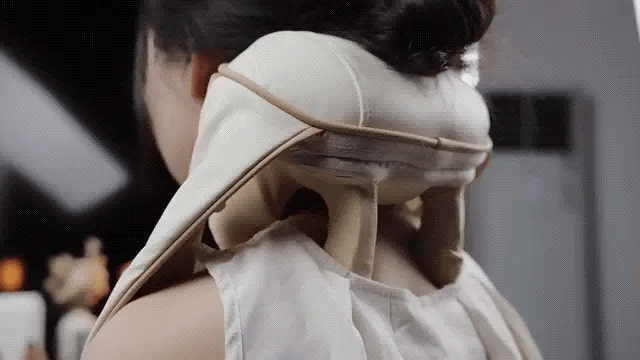 Amiriva Wireless Neck and Shoulder Massager with Heat Function, designed for relaxation and comfort, showing the ergonomic massager draped around a person's neck and shoulders.